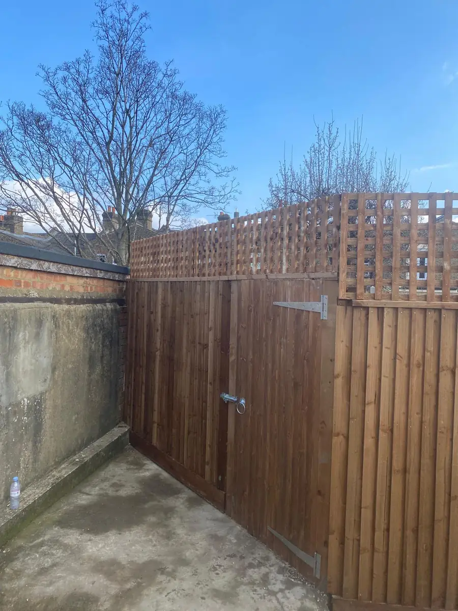 New timber gate and close board fence