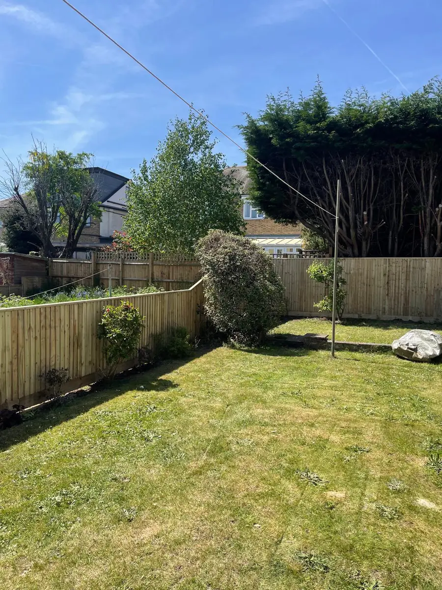 New close board fencing and lawn