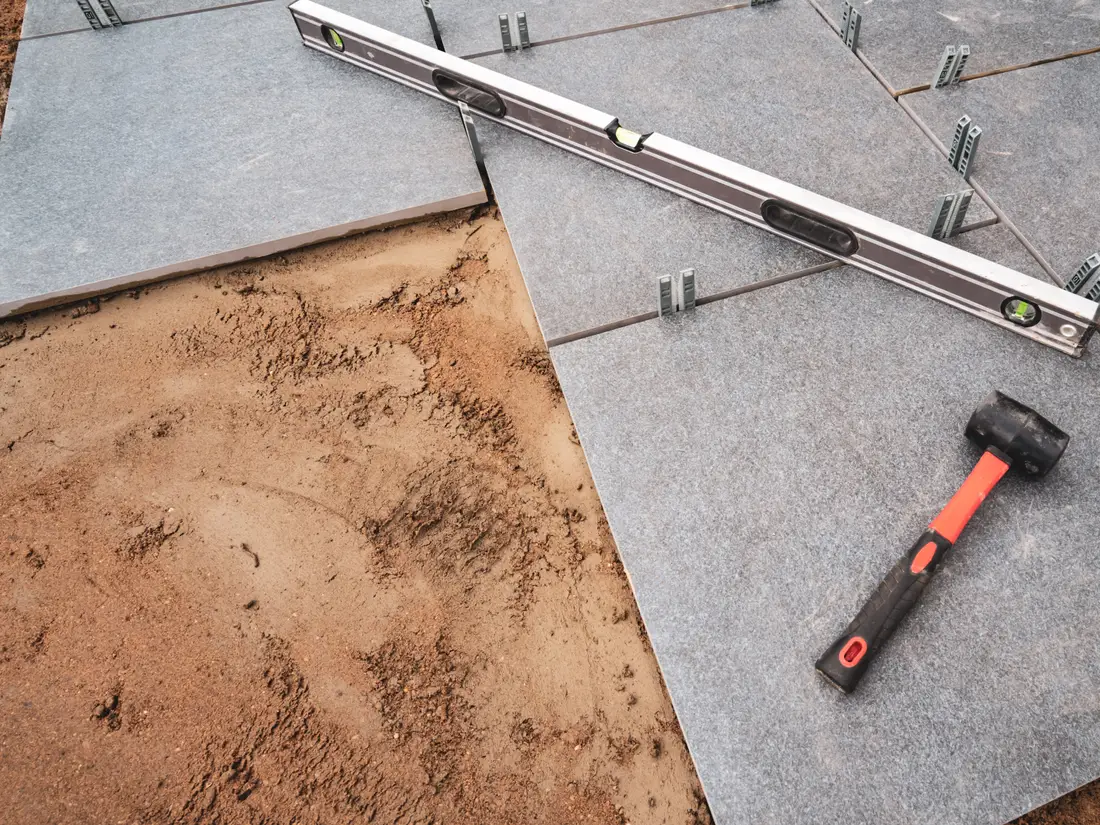 Porcelain patio slabs being laid